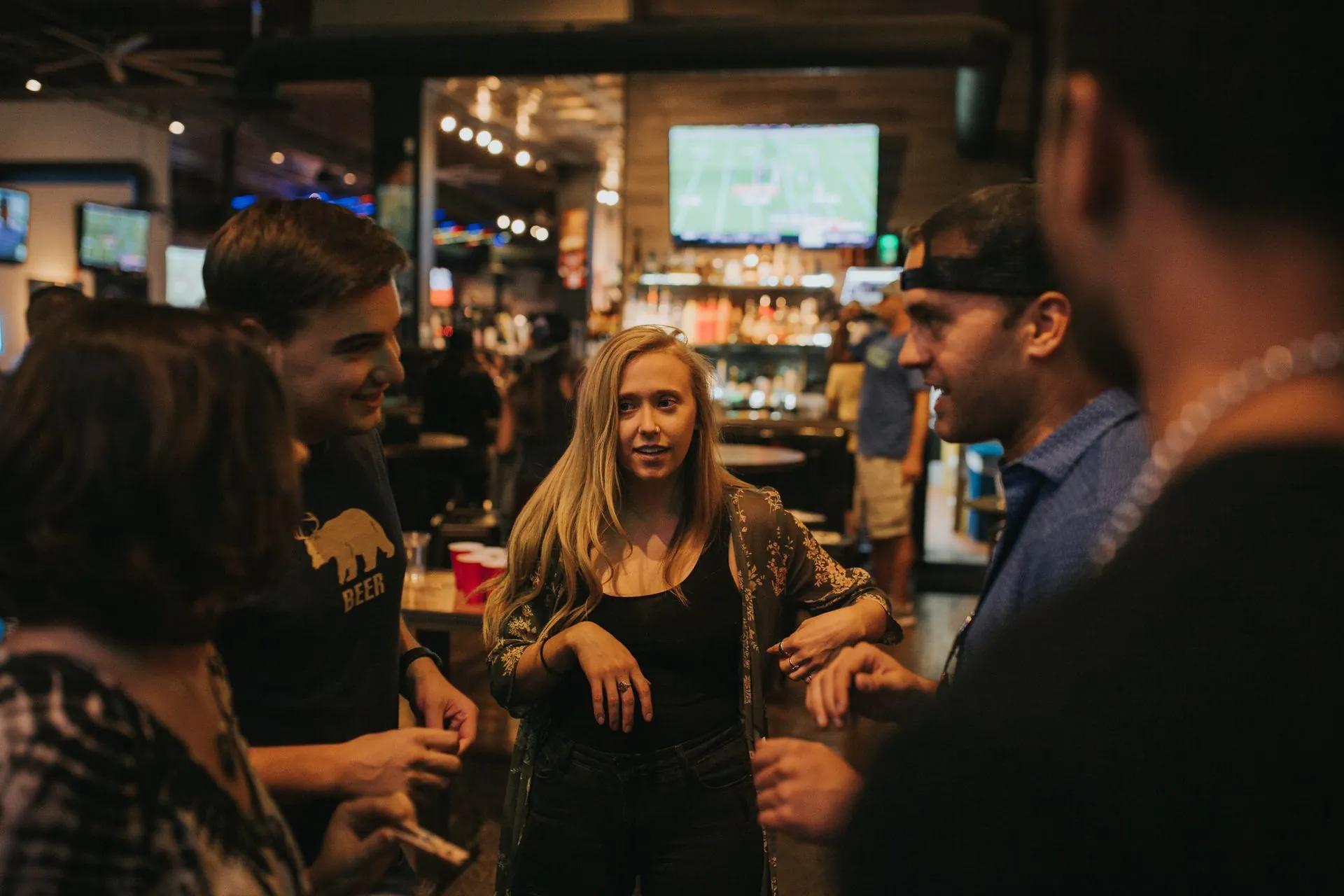 A group deep in conversation at the meetup